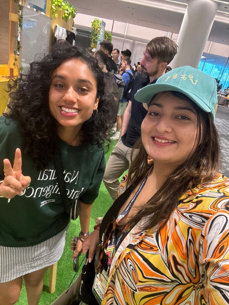 Ruhi with a friend at Devcon 2024